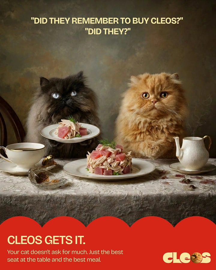 Pets creative ad: Two fluffy Persian cats seated at a formal dinner table with gourmet plates