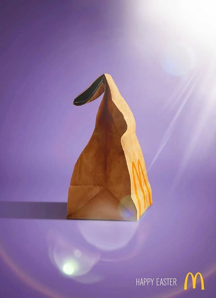 Easter creative ad: Brown paper takeaway bag folded into a bunny-ear shape
