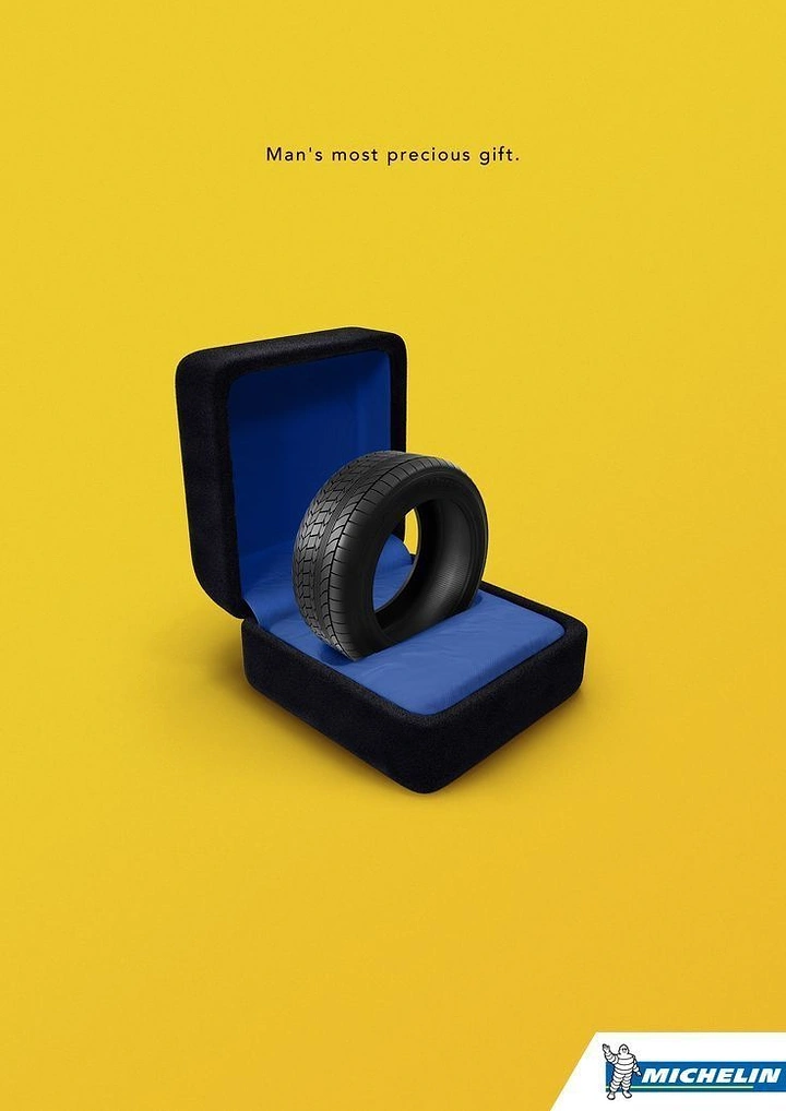 Automotive creative ad: Car tyre presented inside an open velvet ring box