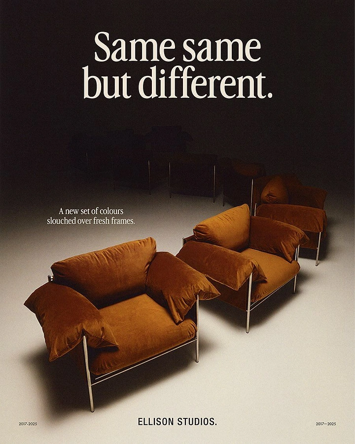Creative ad: Row of rust velvet slouchy armchairs under a spotlight