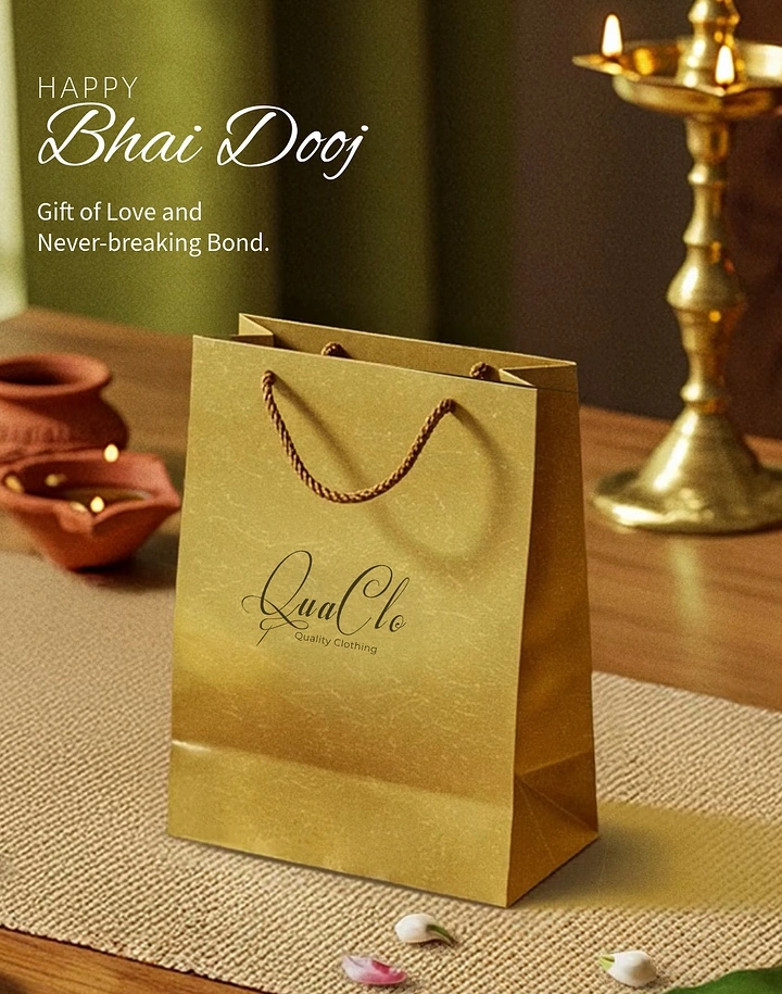 Bhai Dooj creative ad: Gold branded gift bag on a festive table