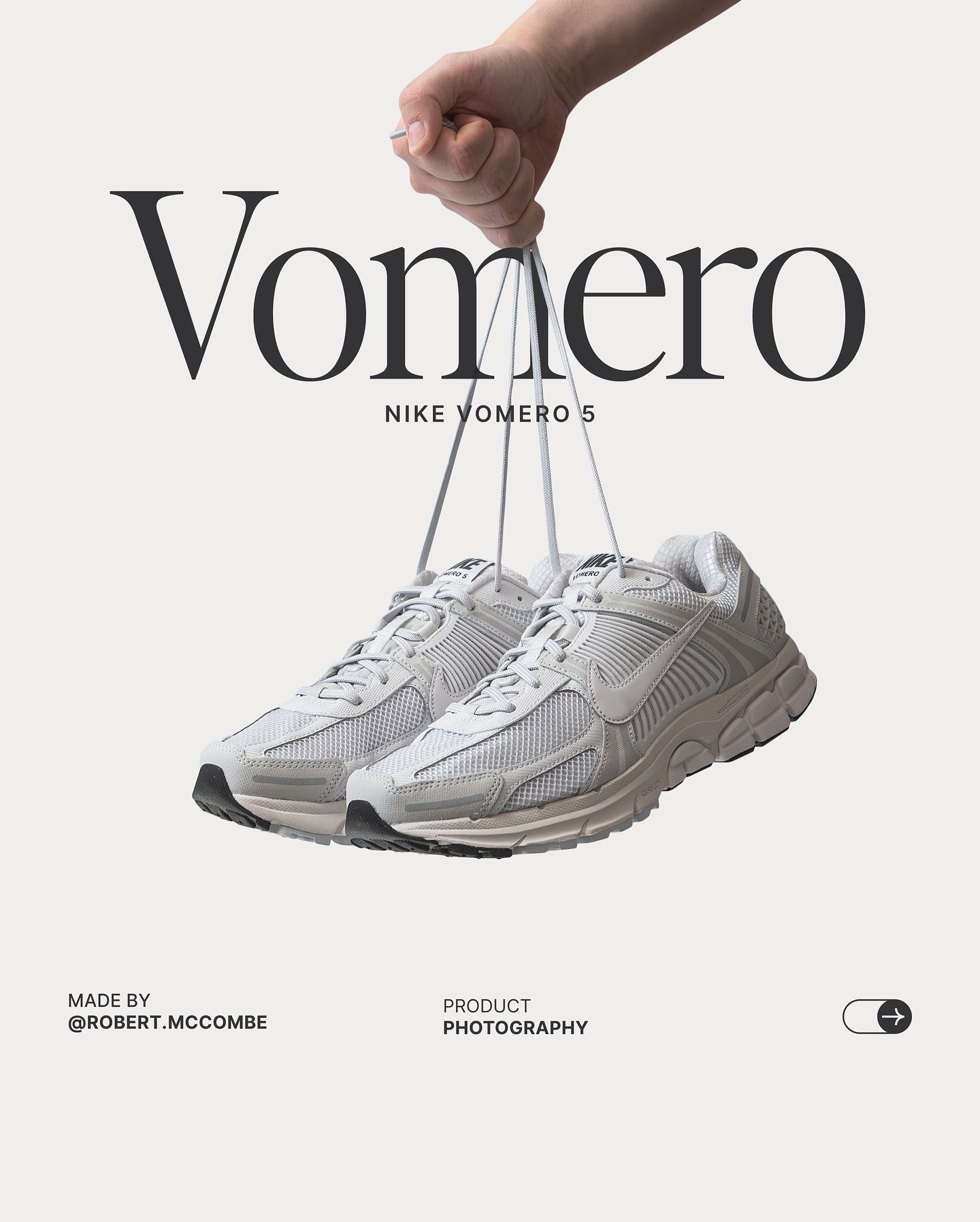 Instagram post: A hand dangling a pair of grey running sneakers by their laces