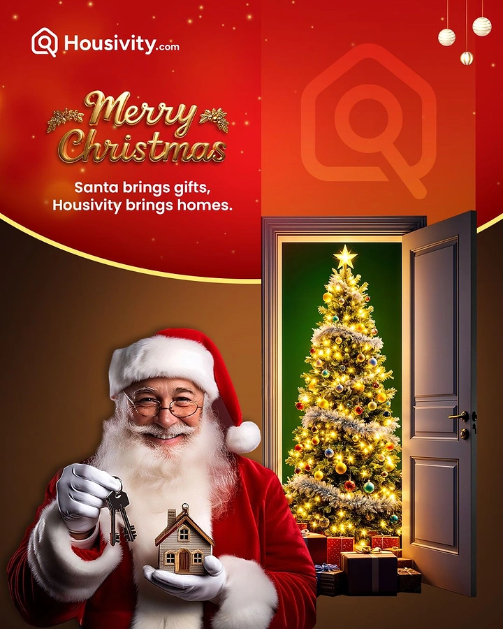 Christmas creative ad: Santa holding house keys and a miniature house beside an open door showing a lit Christmas tree