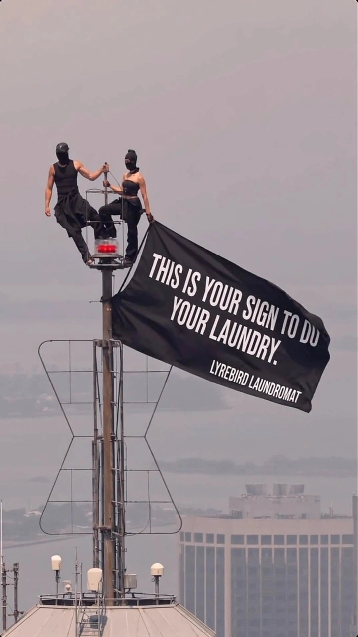 Laundry & Dry Cleaning creative ad: Literal flag: this is your sign pun