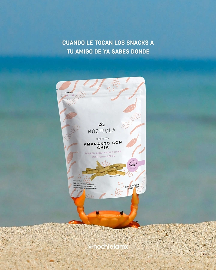 Snacks & Namkeen Brands creative ad: Crab stealing snack pack on beach