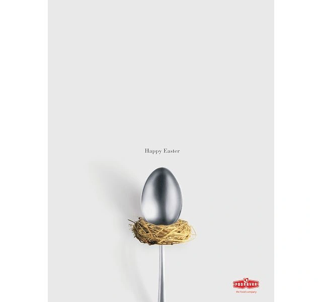 Easter creative ad: Spoon bowl as an egg in a straw nest