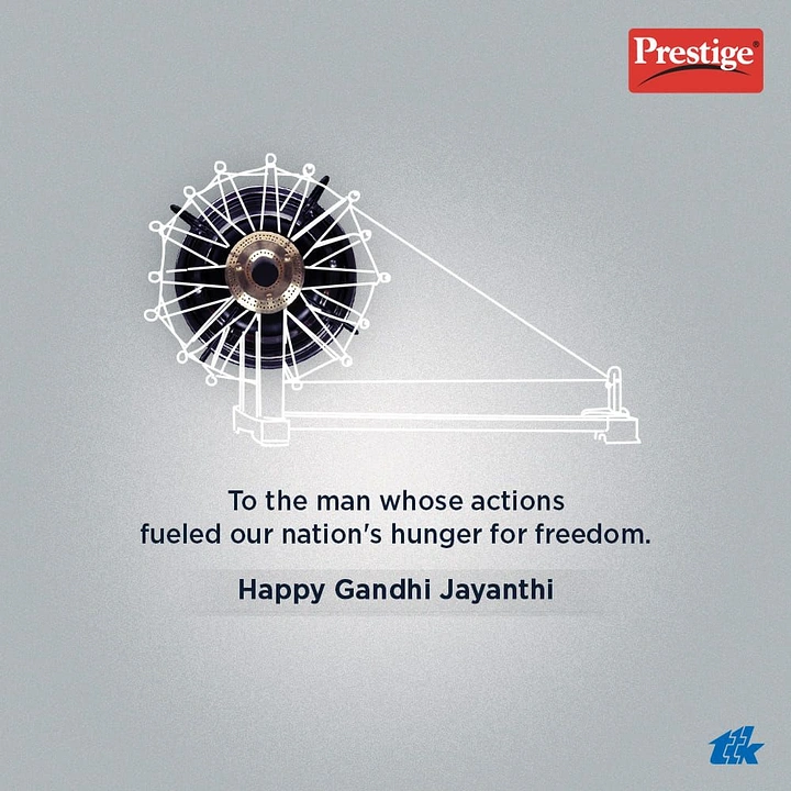 Gandhi Jayanti creative ad: Gas stove burner forming the hub of a white line-drawn charkha