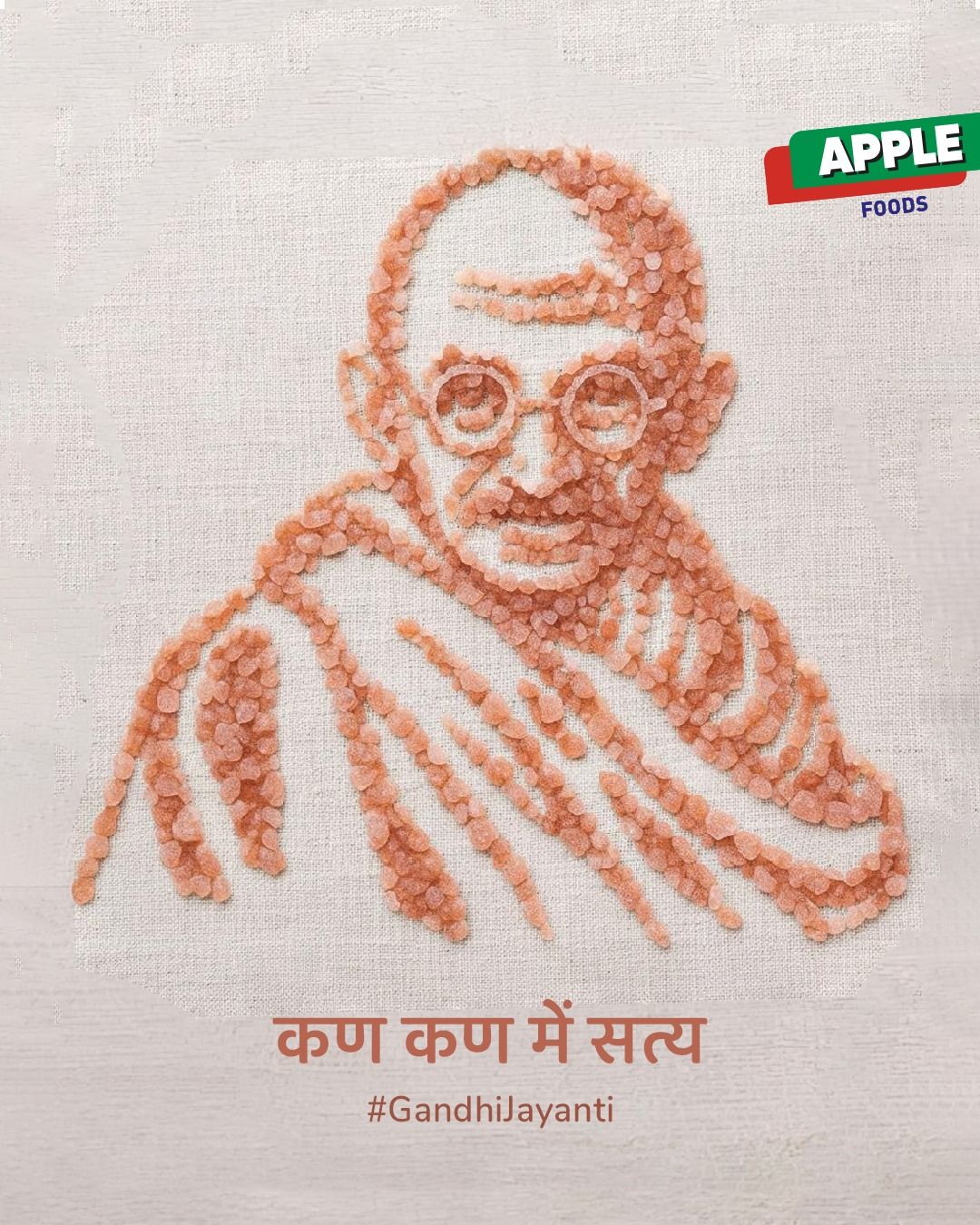 Gandhi portrait made of pink rock salt crystals