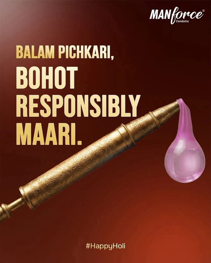 Holi creative ad: Ornate brass pichkari with a pink condom-like water balloon at its tip