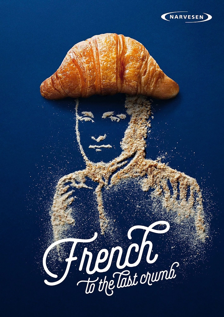 Restaurant & Cafe creative ad: Croissant as Napoleon's bicorne hat over a portrait drawn in crumbs