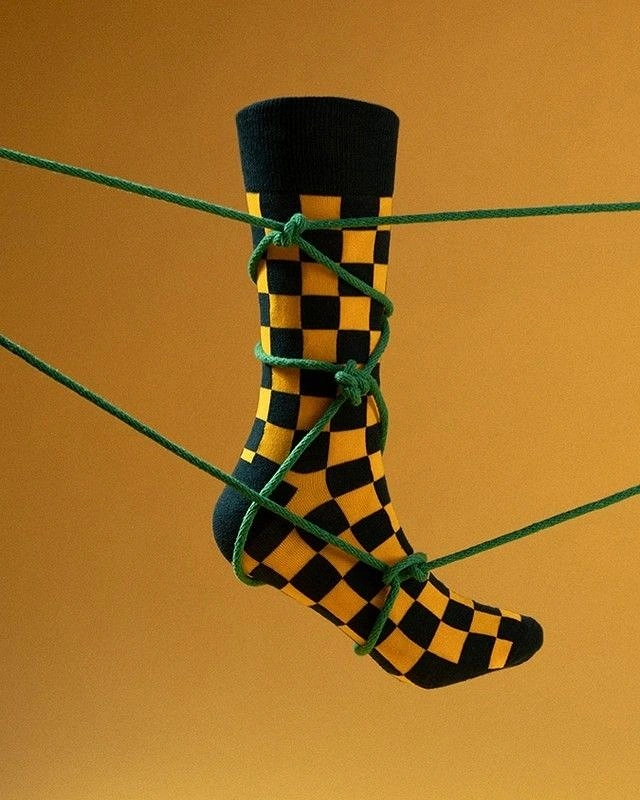 Socks Brands creative ad: Sock becomes surreal laced footwear sculpture