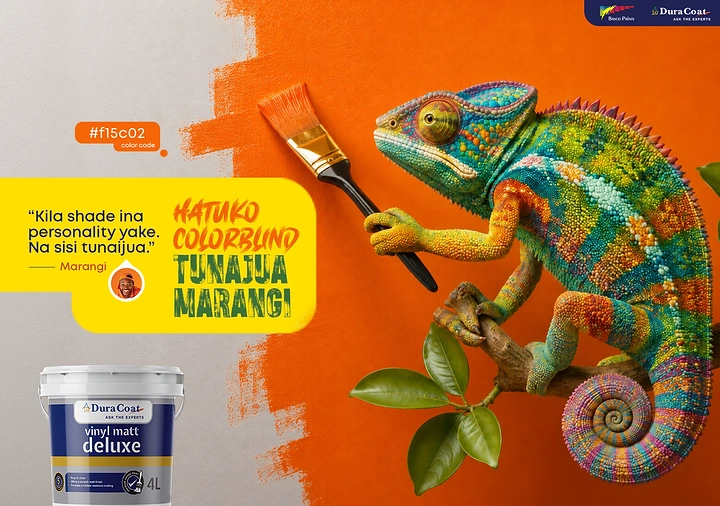Construction creative ad: A highly detailed multicolored chameleon holding a paintbrush against a split orange wall