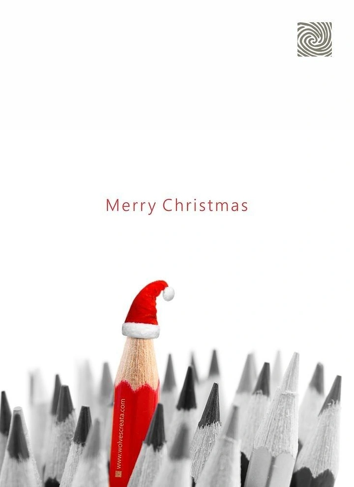 Christmas creative ad: Red pencil wearing a Santa hat among grey pencils