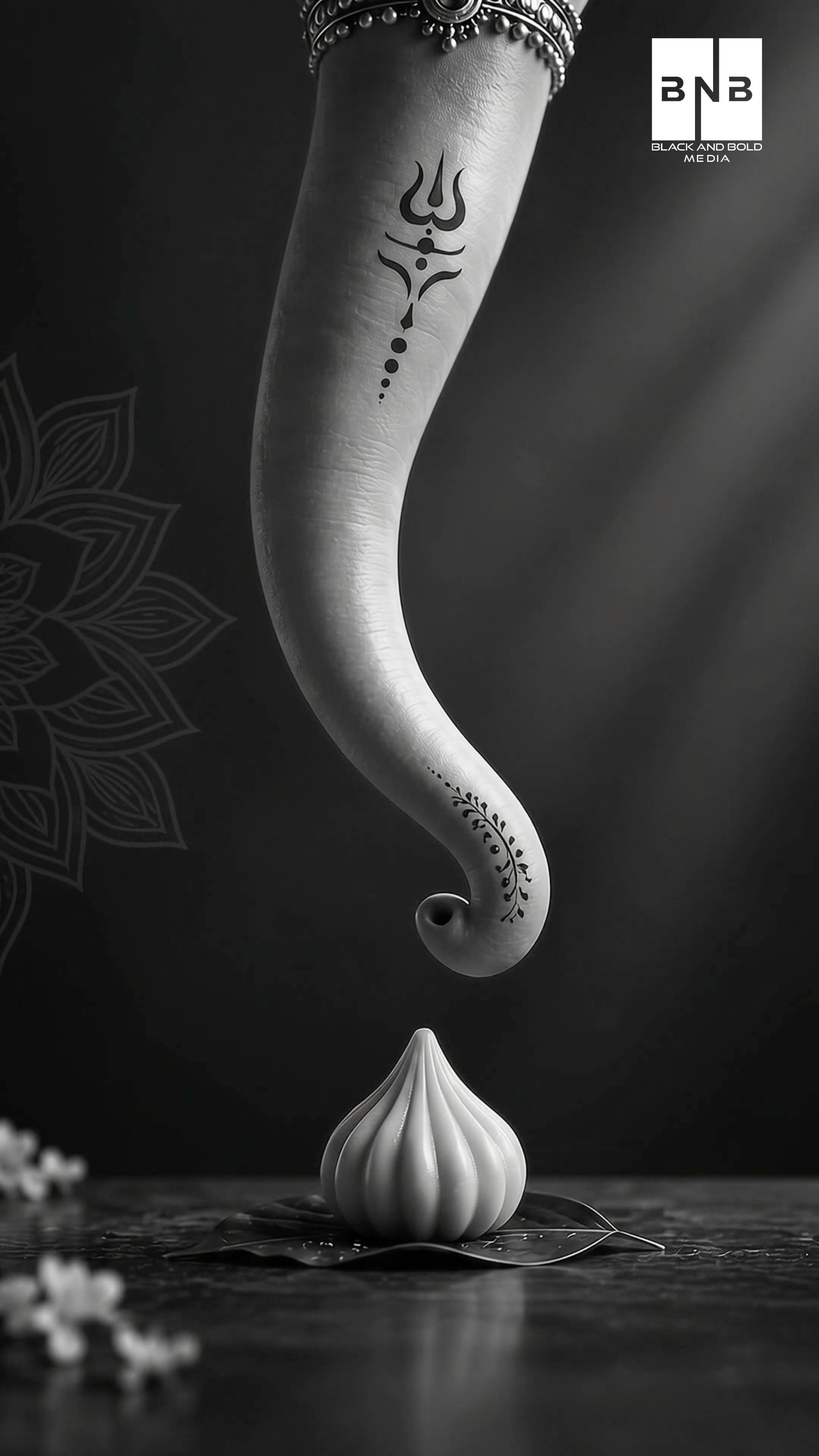 Ganesh Chaturthi Story: Ganesha's trunk curling down toward a single modak
