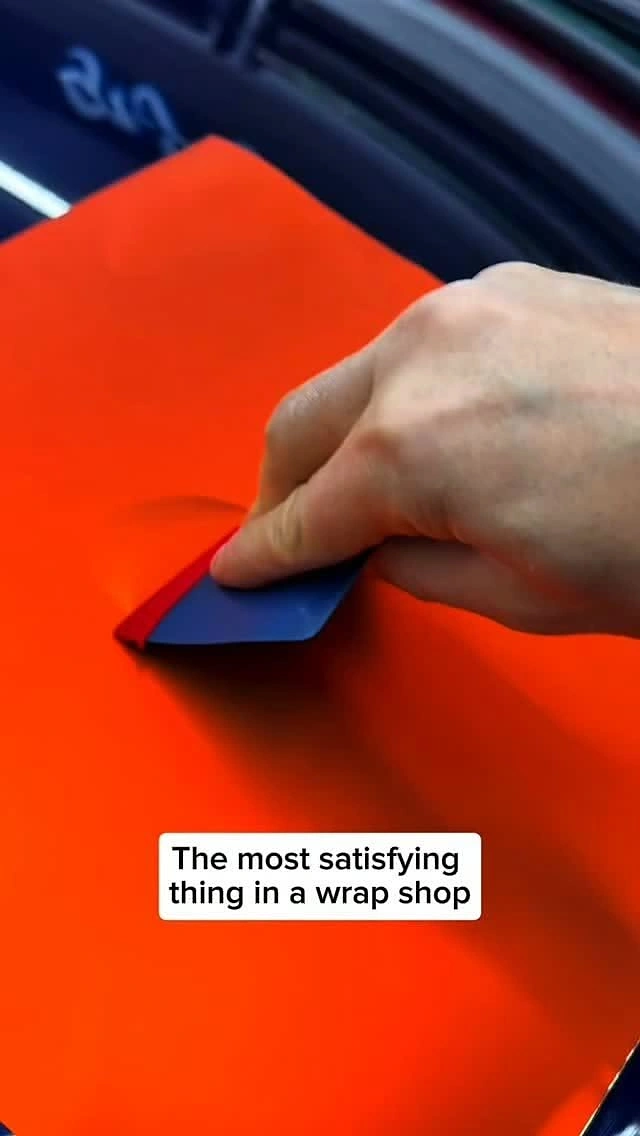 Window Tinting & Car Wraps creative ad: Satisfying squeegee action drives witty copy