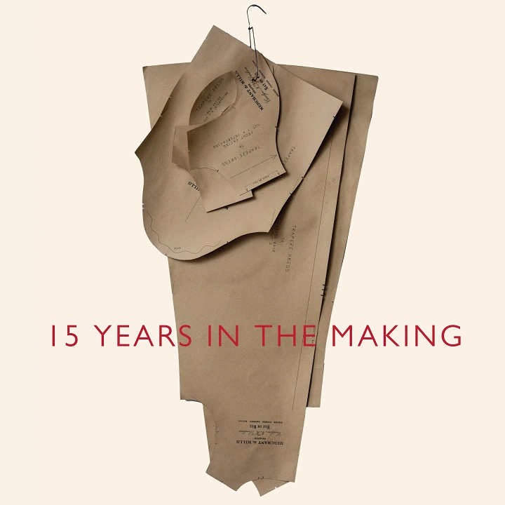 Handmade & Small Makers creative ad: Kraft-paper dress pattern pieces hanging from a wire hook