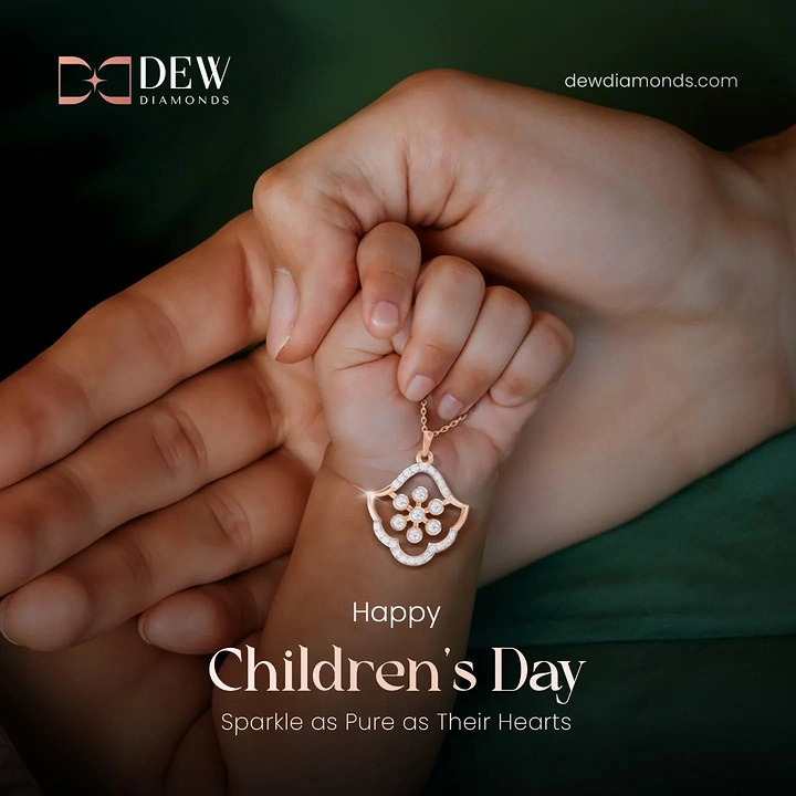Children's Day creative ad: Adult hand holding a baby's fist with a diamond pendant
