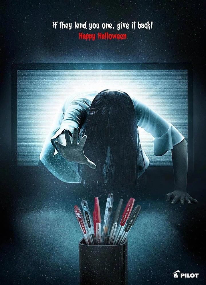 Halloween creative ad: Long-haired ghost crawling out of a static TV screen and reaching for a cup of pens