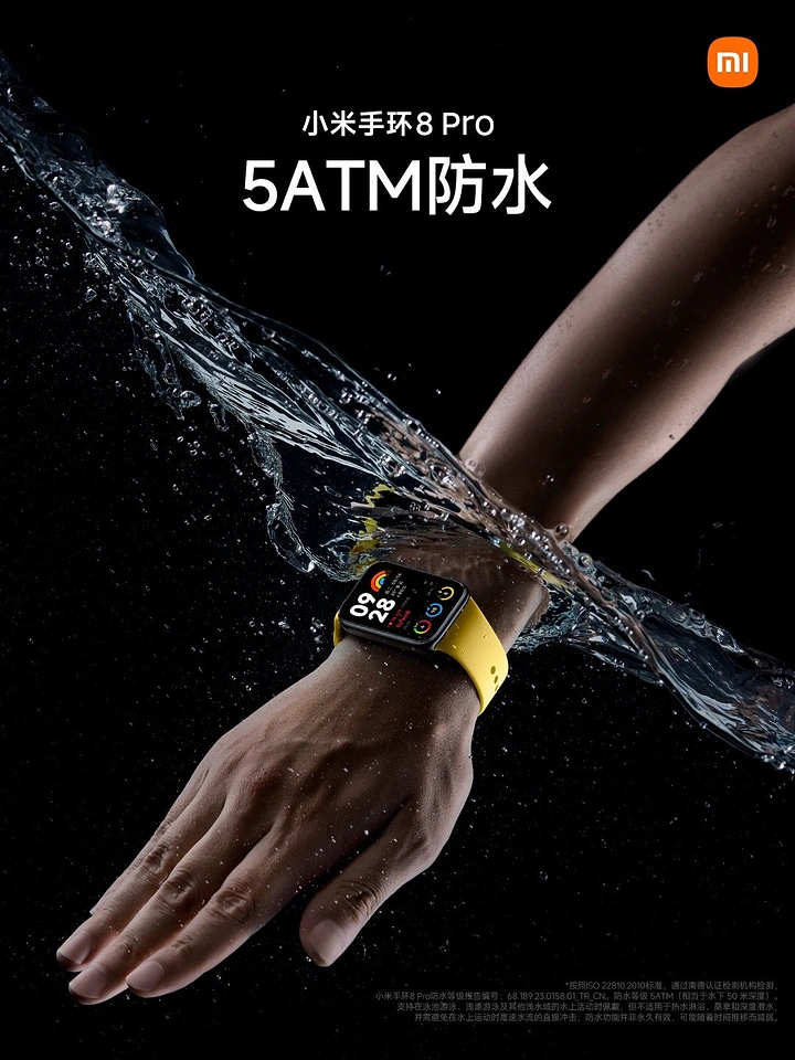 Electronics creative ad: Wrist wearing yellow-strap smart band cutting through a water splash