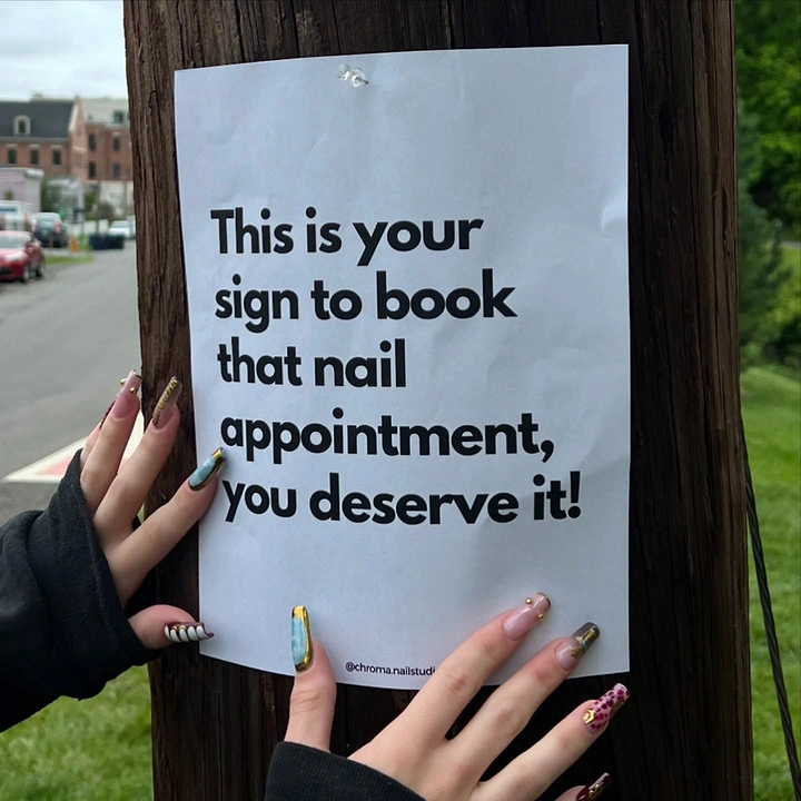 Nail Salons creative ad: Literal 'this is your sign' pole flyer pun