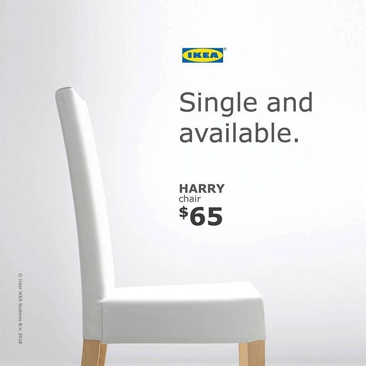 Valentine's Day creative ad: White upholstered dining chair in profile