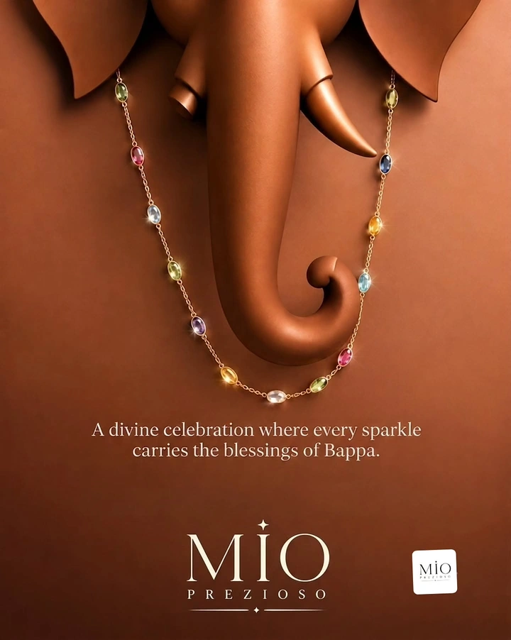 Ganesh Chaturthi creative ad: Gemstone station necklace draped across a sculpted copper Ganesha face