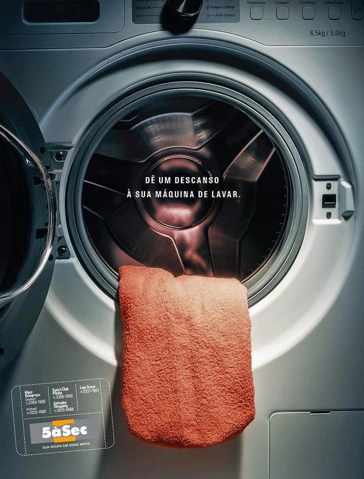 Laundry & Dry Cleaning creative ad: Towel hangs like tired machine's tongue