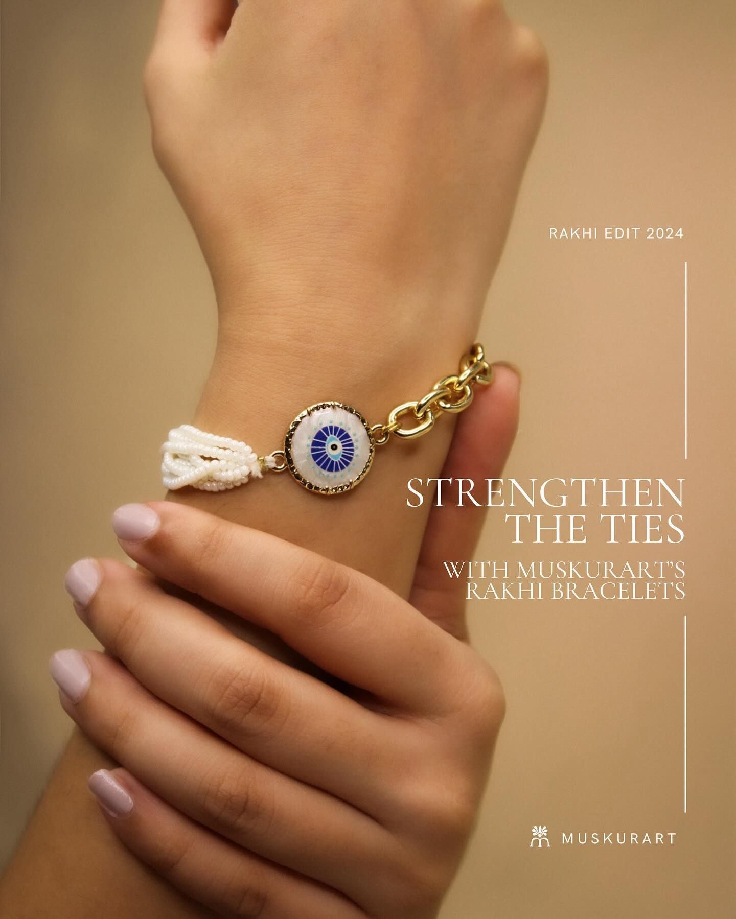 Wrist wearing an evil-eye pearl and gold rakhi bracelet