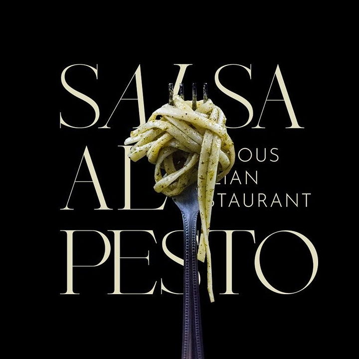 Restaurant & Cafe creative ad: Fork twirled with pesto linguine in front of huge serif type