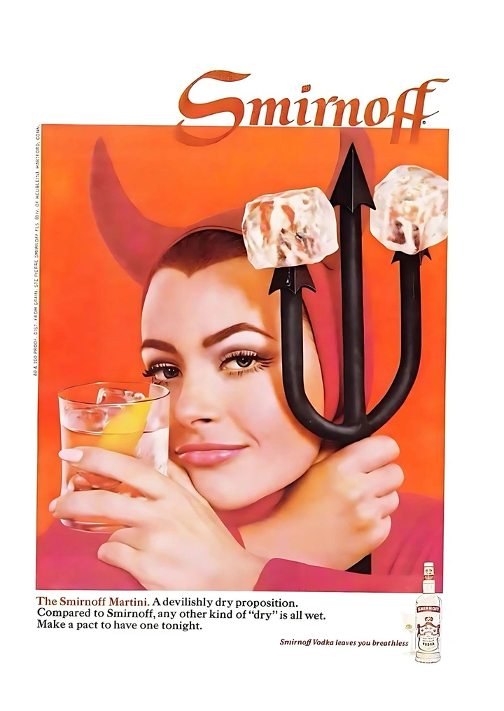 Creative ad: Woman in red devil hood holding a martini and pitchfork with ice cubes on its prongs