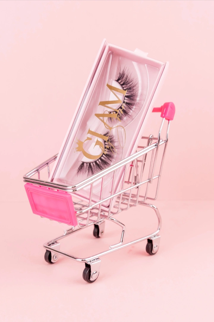 Lash & Brow Studios creative ad: False-lash box in a miniature shopping cart