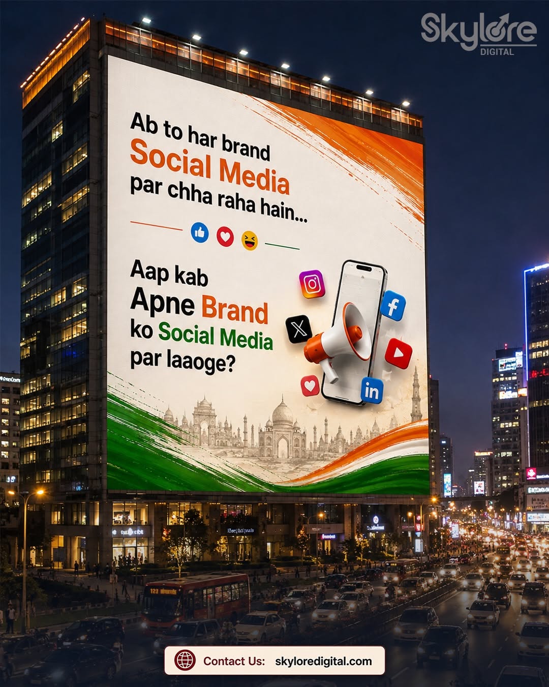 Giant roadside billboard showing a tricolour flag ad at dusk